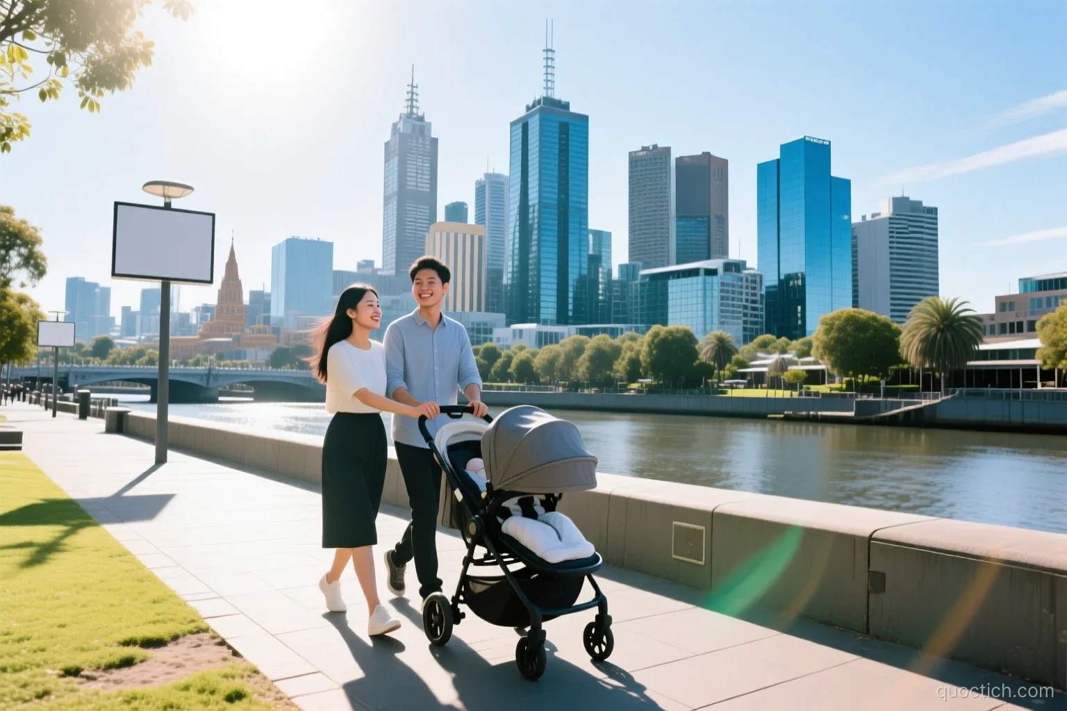 Young Vietnamese couple pushing a baby stroller along the Southbank riverside promenade in Melbourne with the Yarra River and glass towers behind, wide shot, bright morning sun